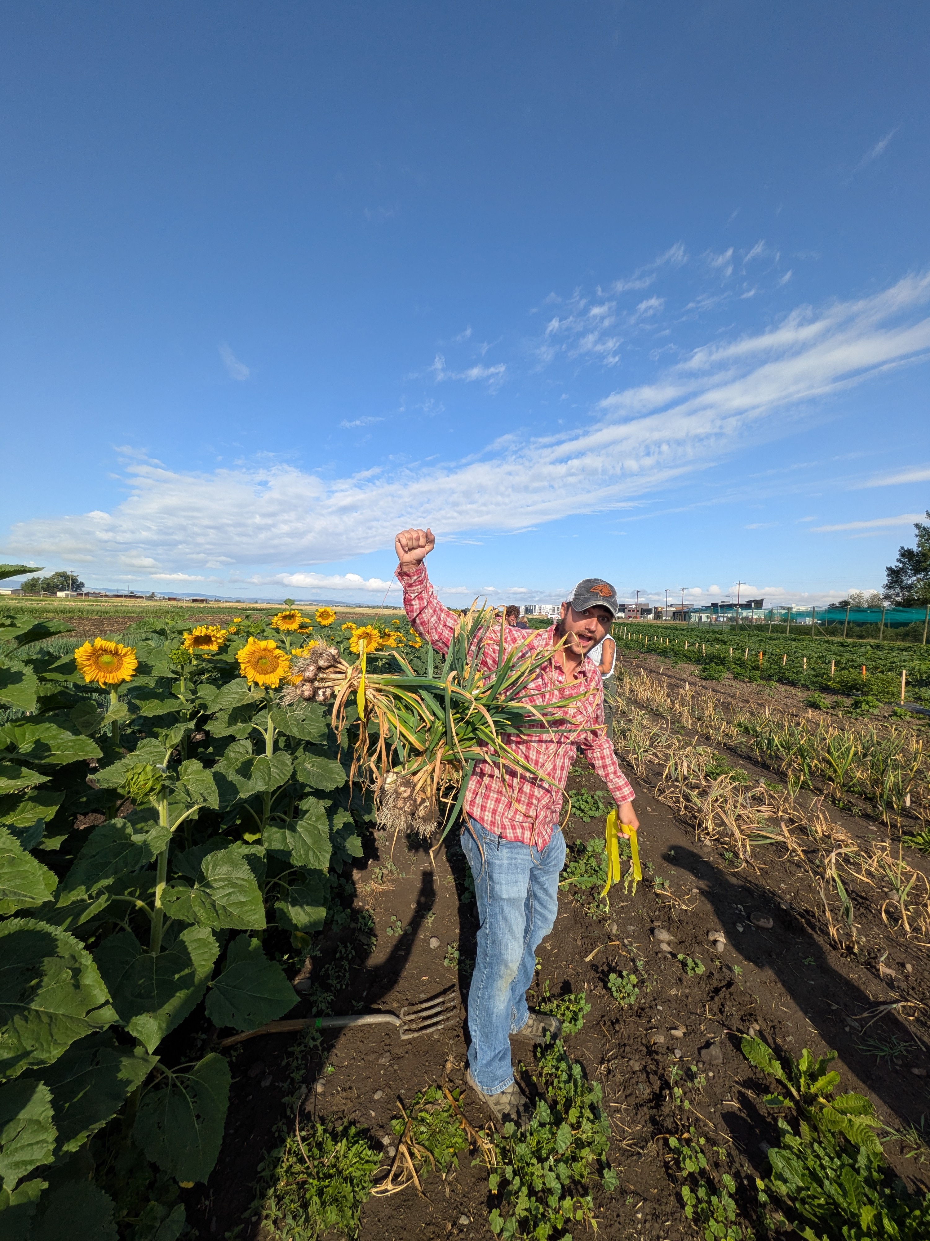 Joshua holding garlic
