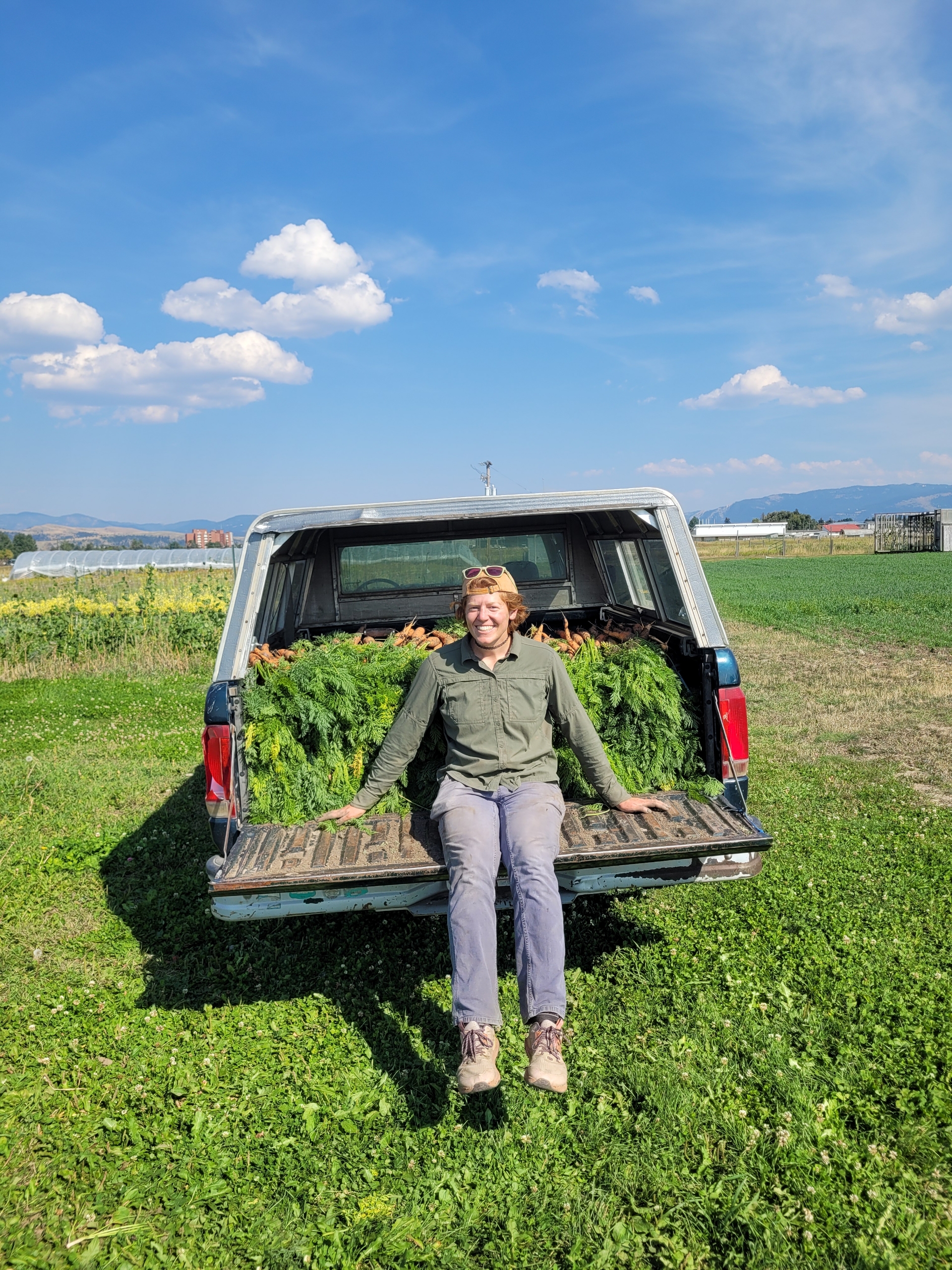 Sophie sitting on truck bed